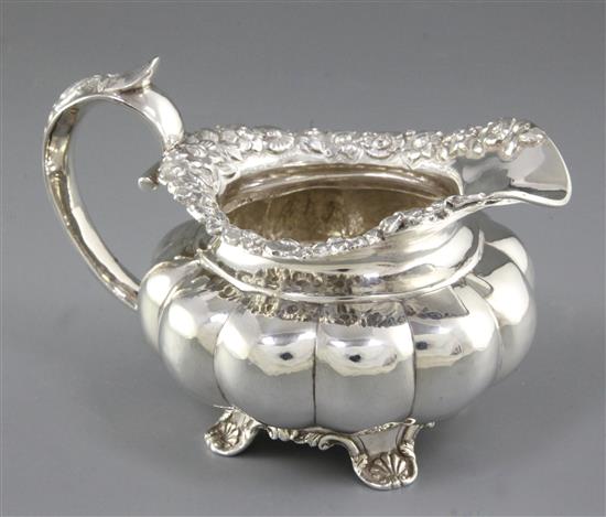 A William IV Irish silver melon shaped cream jug, height 117mm, weight 9.6oz/300grms.